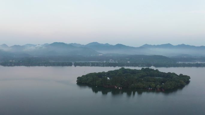 浙江杭州西湖雷峰塔全景雨后晨雾空镜航拍