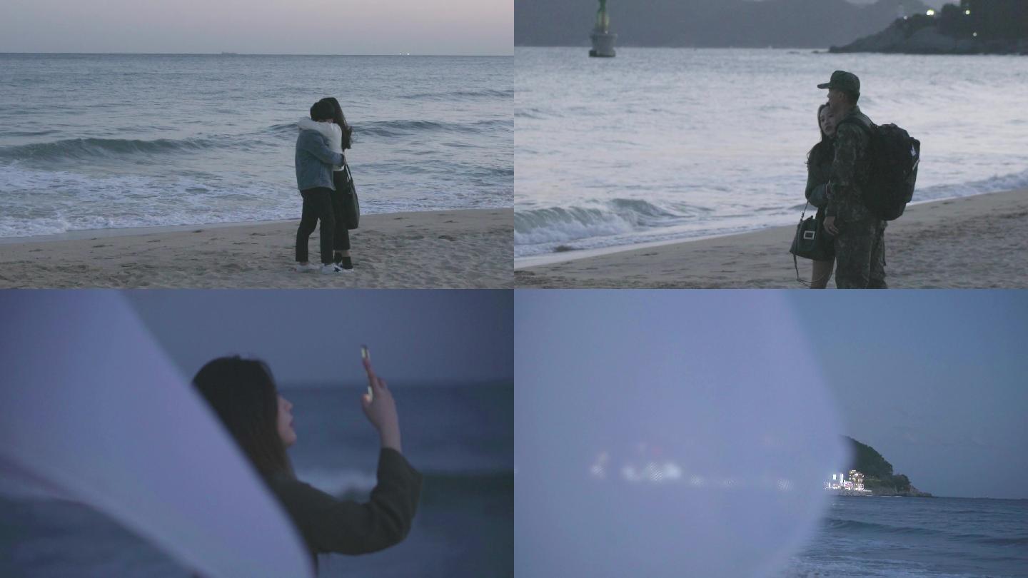 海滩边的恋人在拥抱，一起看海