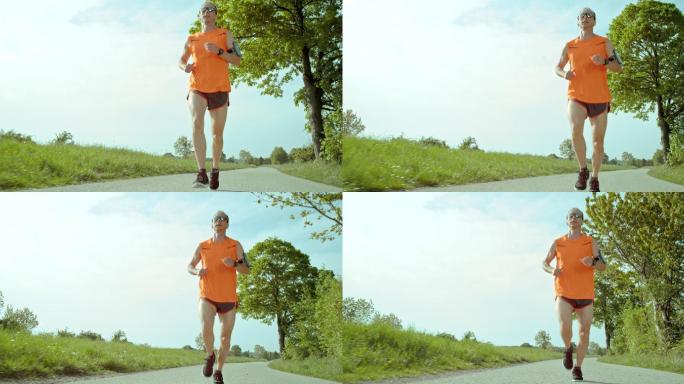 马拉松运动员在阳光明媚的日子跑步