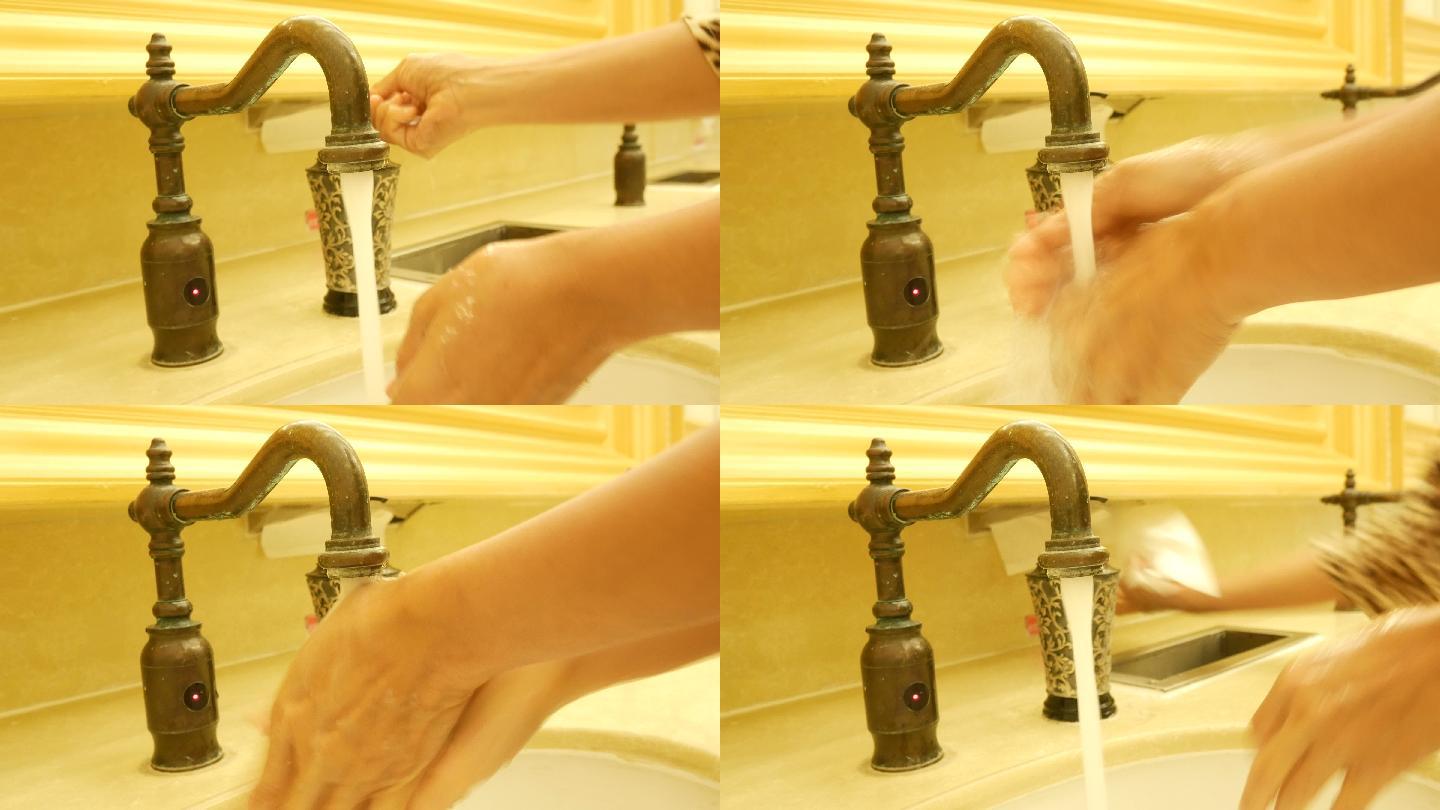 洗手的女人水槽洗涤浴室水槽