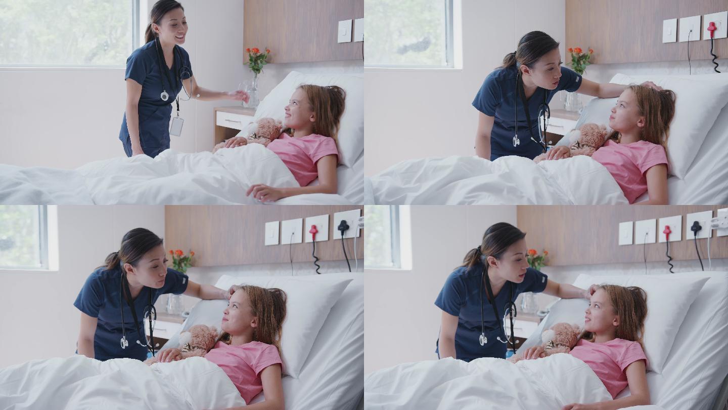 护士探望病床上的小女孩