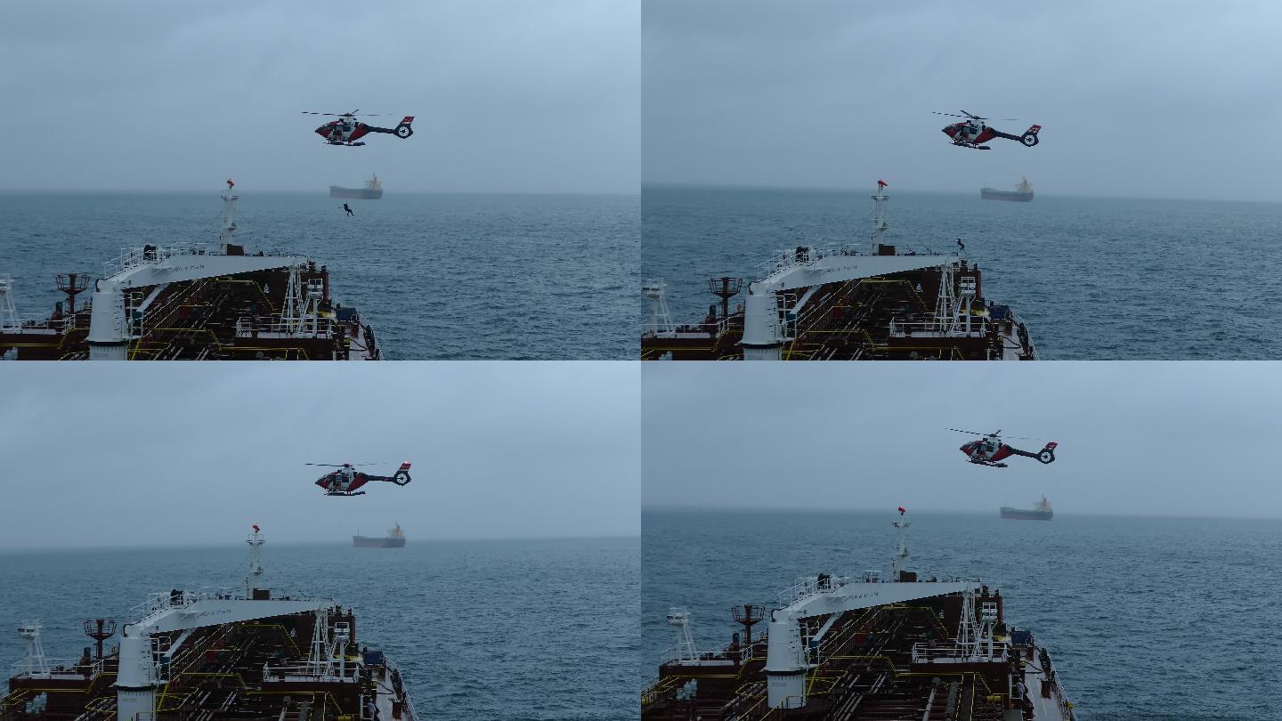 救援人员从直升机下降到船上