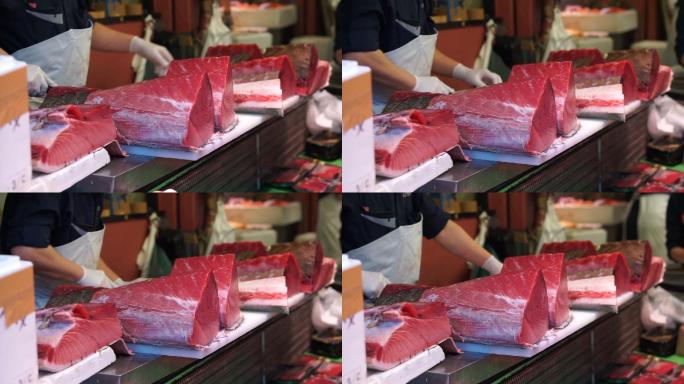 厨师用锋利的刀切割肉