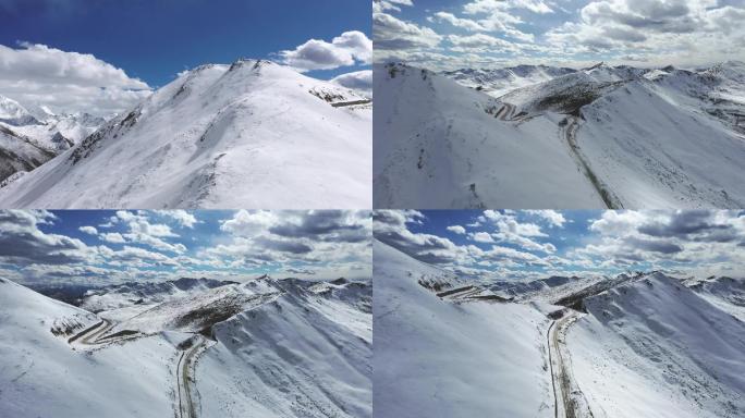 4K航拍雪山蓝天白云下的雪山山脊