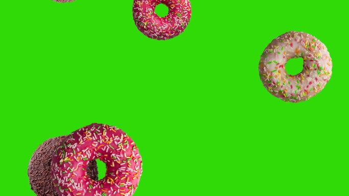 绿色屏幕上美味甜甜圈下落的动画。