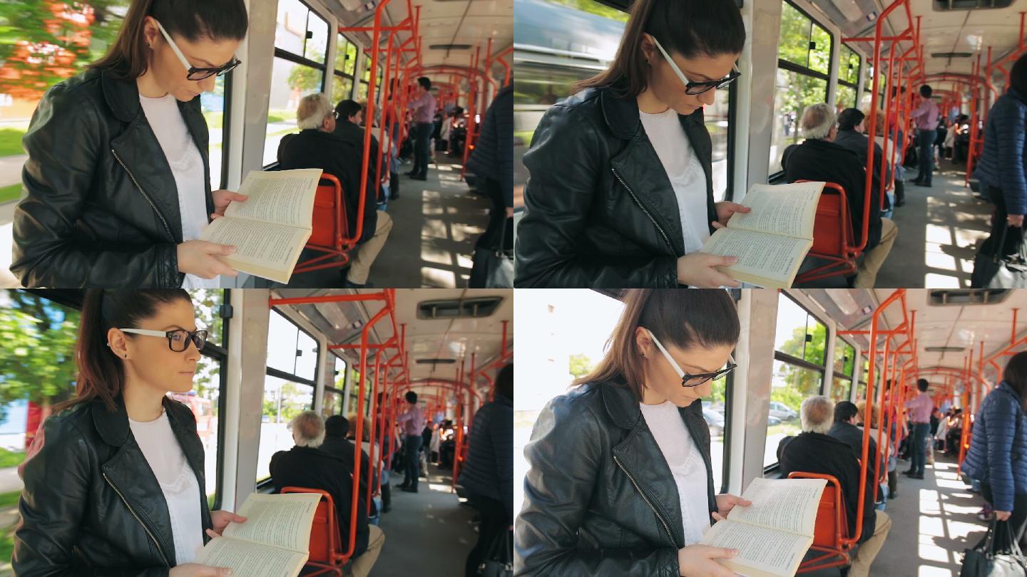 女性在车上看书书籍公共汽车电车