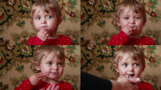 婴儿吐出不卫生食物的特写镜头