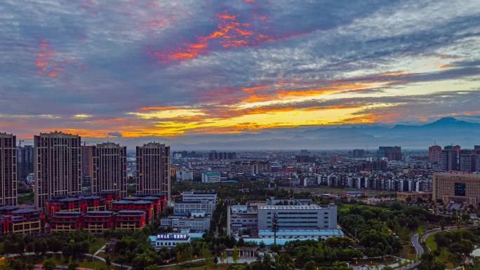 公园夕阳火烧云航拍延时城市夕阳