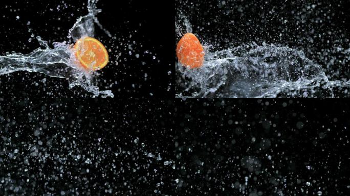 把一半的橙子泼在水里