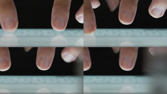 虚拟键盘上的人类手指打字特写