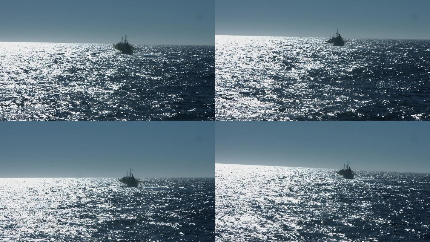 大西洋逆光海面  一艘远洋渔船驶向远方