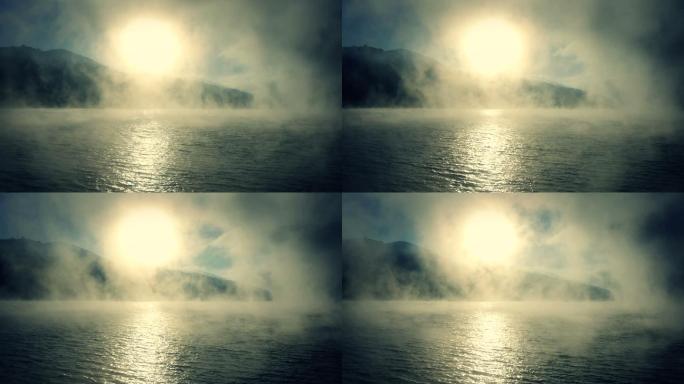 湖面上雾蒙蒙的日出