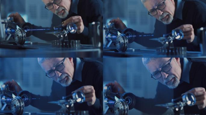 中年工程师使用高精度激光设备
