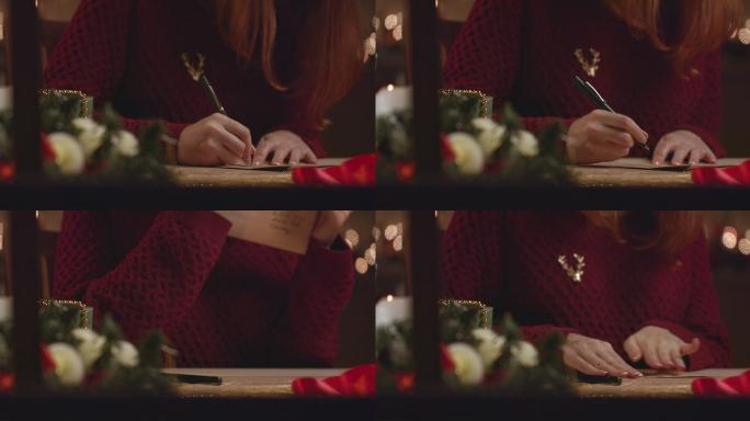 美丽的女孩给圣诞老人写信。