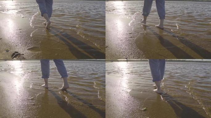 夕阳浅滩脚步散步慢动作
