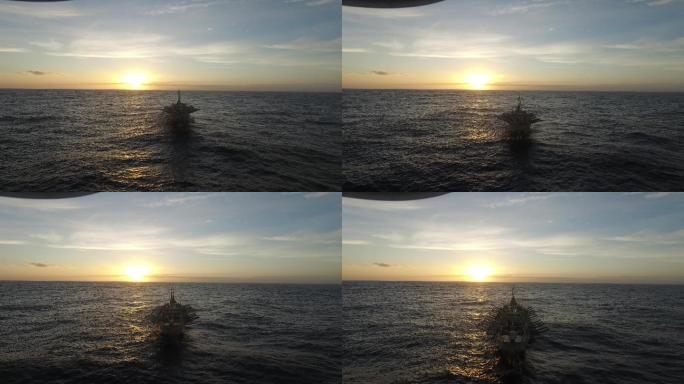 夕阳下 大西洋上 航拍远洋渔船全景
