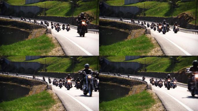公路上一群摩托车行驶过去
