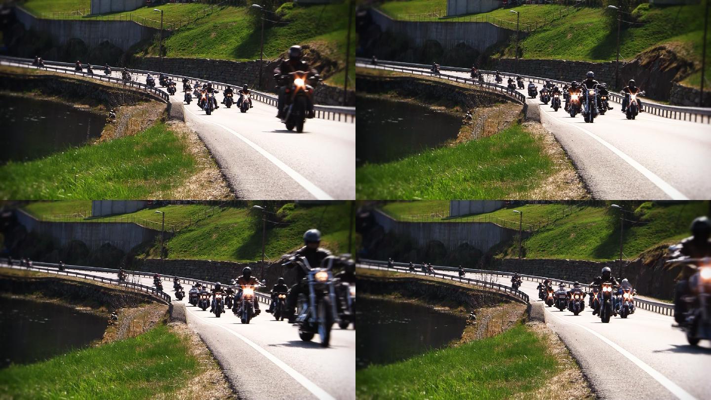 公路上一群摩托车行驶过去