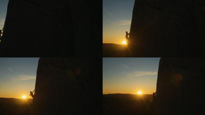在令人惊叹的日落中攀岩