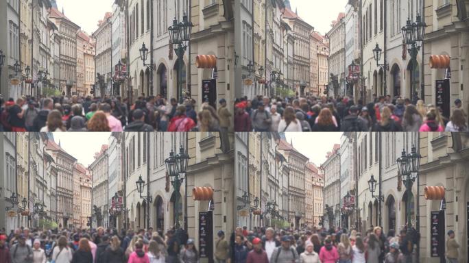 布拉格的街道上的游客络绎不绝。