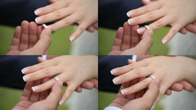 新娘和新郎在婚礼上交换结婚戒指
