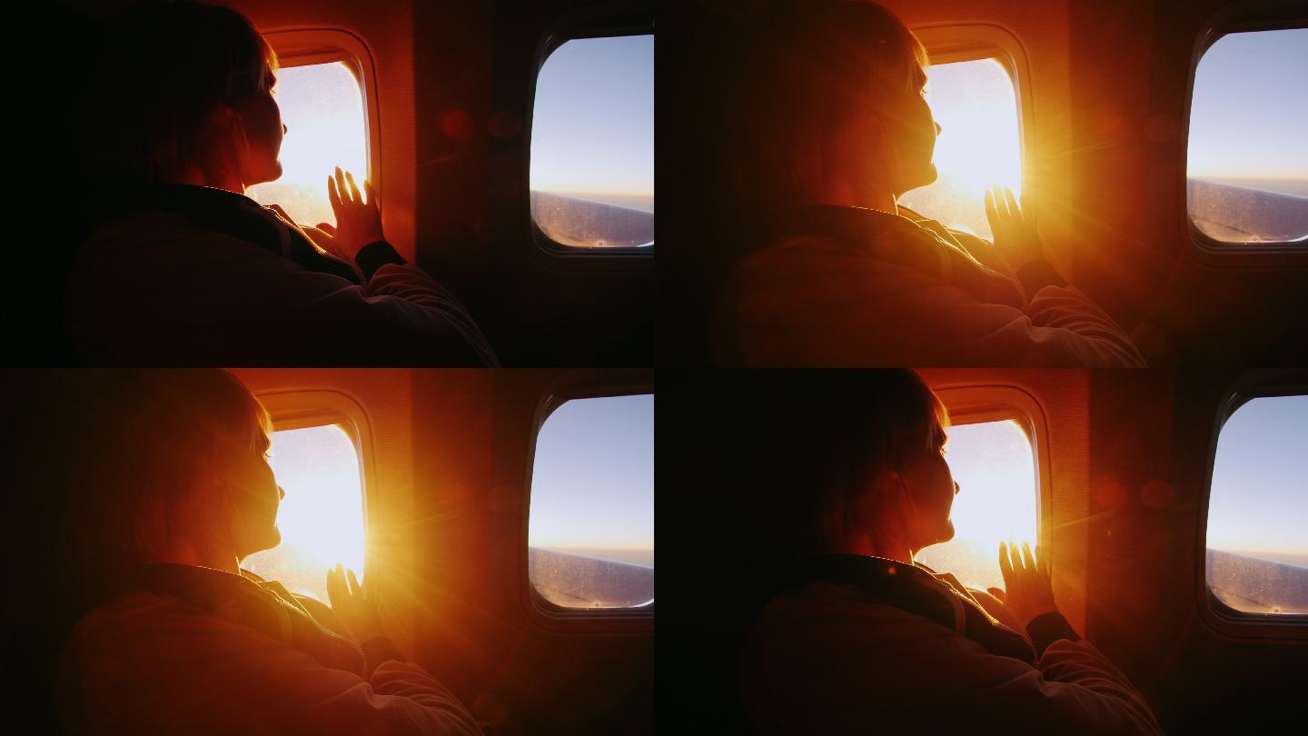 从飞机的窗口触碰光