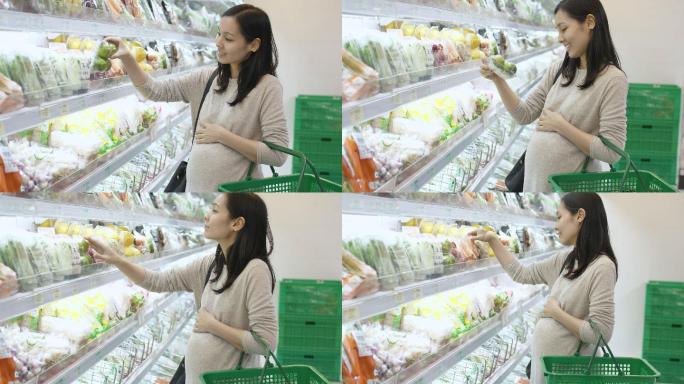 孕妇在超市购物购物篮超市蔬菜