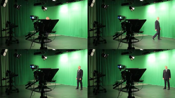 成熟男性电视节目主持人走进电视演播室