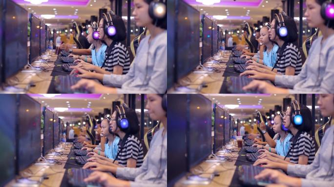 女孩玩电脑游戏网咖环境网吧娱乐打游戏