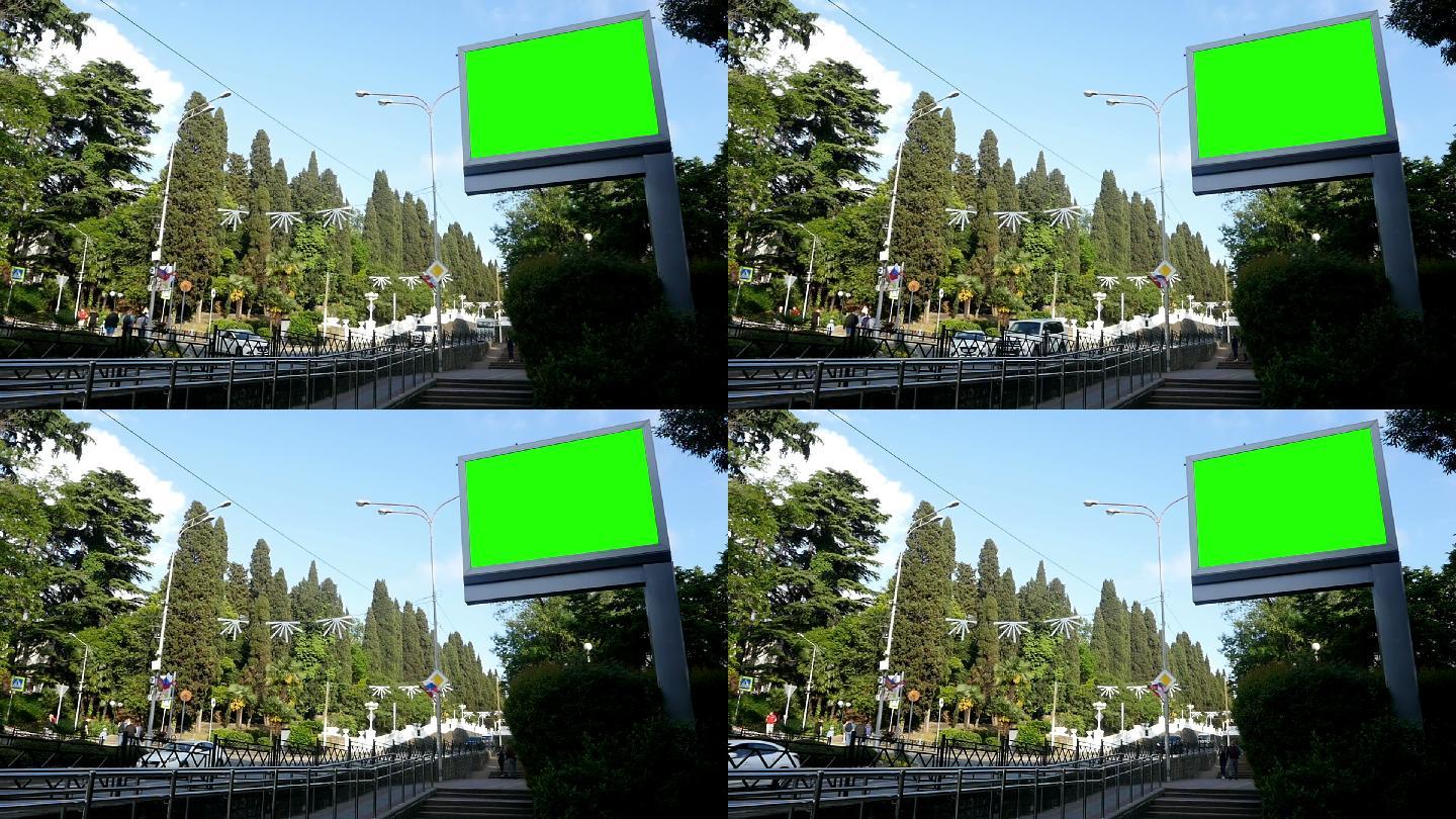 城市街道背景上的广告牌绿屏