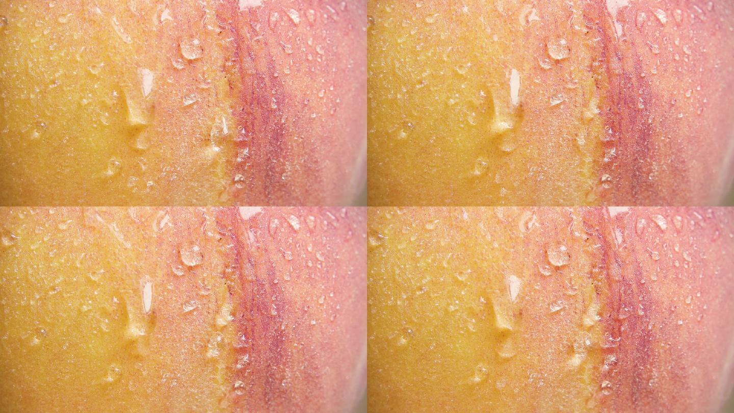 缓慢的水滴沿着桃子皮流下特写镜头