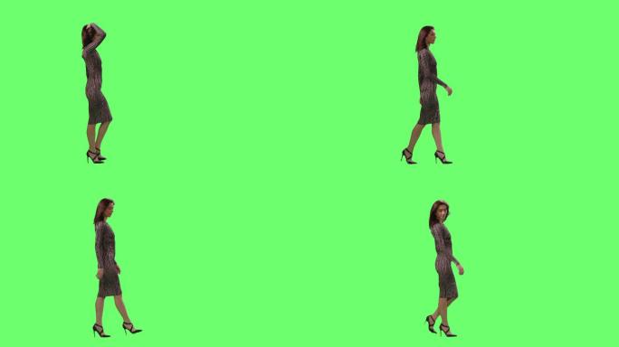 女性优雅地走在模拟绿色屏幕上