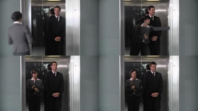 乘坐电梯的商人商务人士业务员工敬业度