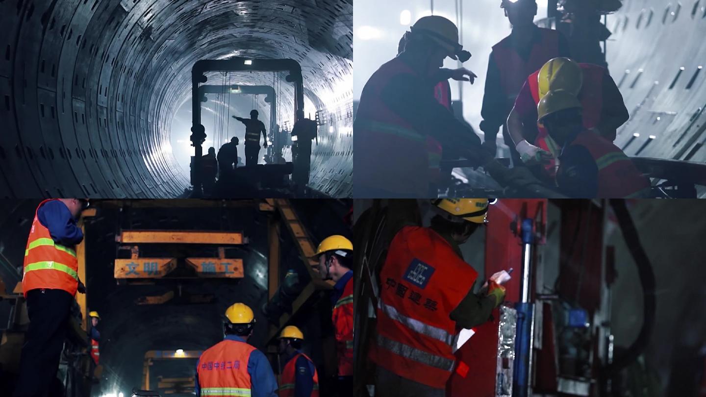 隧道施工现场工人指挥机械运作
