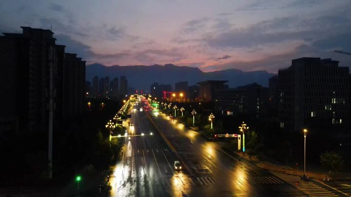 航拍：小城都市雨后夜景晚霞