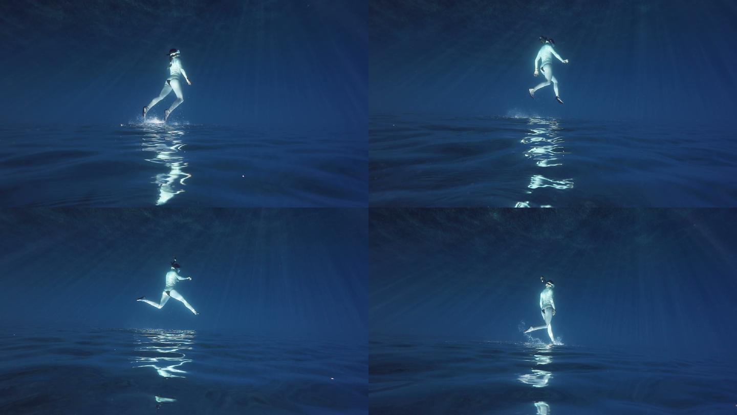 自由潜水员在水面上行走
