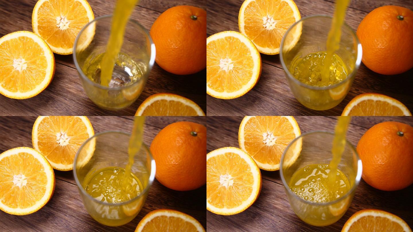 健康的橙汁倒在杯子里