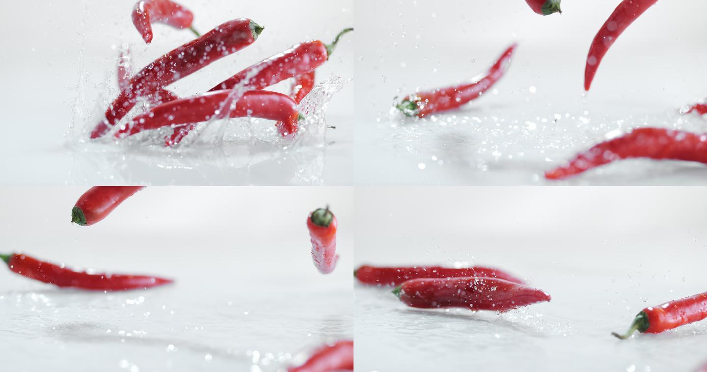 红辣椒落在白水覆盖的表面上