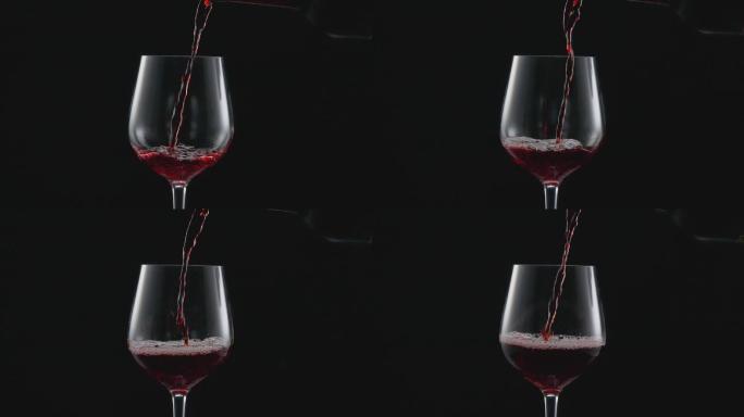 往红酒杯里倒葡萄酒慢镜头视频素材