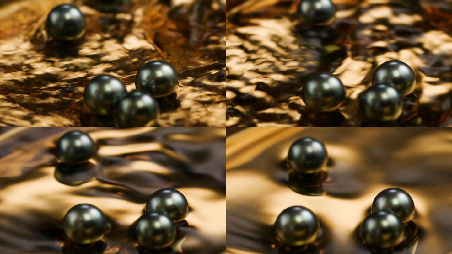 水中滚动的天然大溪地黑珍珠