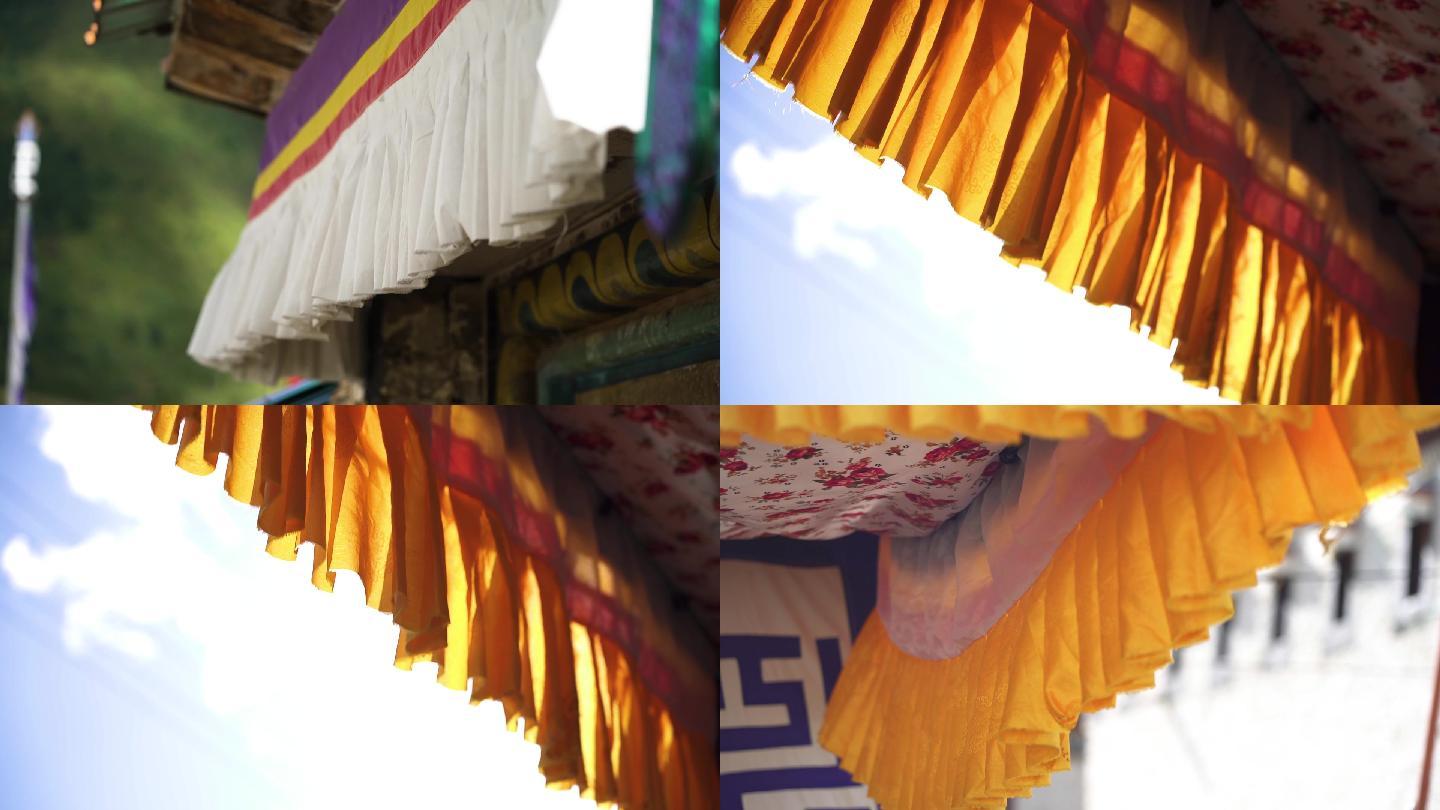 藏传寺庙风吹动彩色窗摆