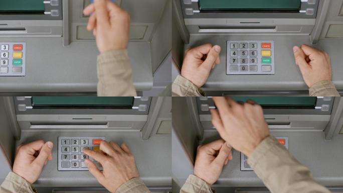 手插入银行卡并在ATM键盘上输入密码