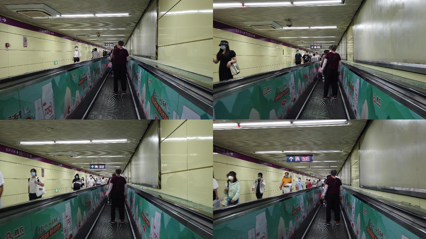 北京地铁站地下通道乘客直行电梯