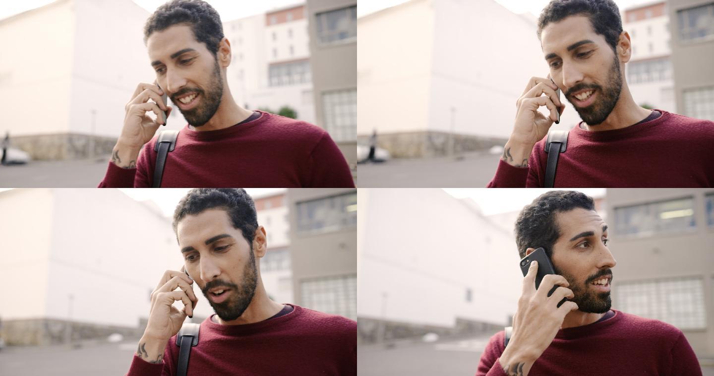 一个年轻人在城市里使用手机