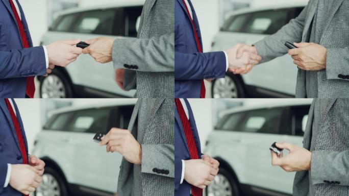 买卖汽车，商人和握手的概念