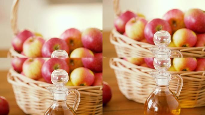 篮子里的苹果和桌上的一罐果汁