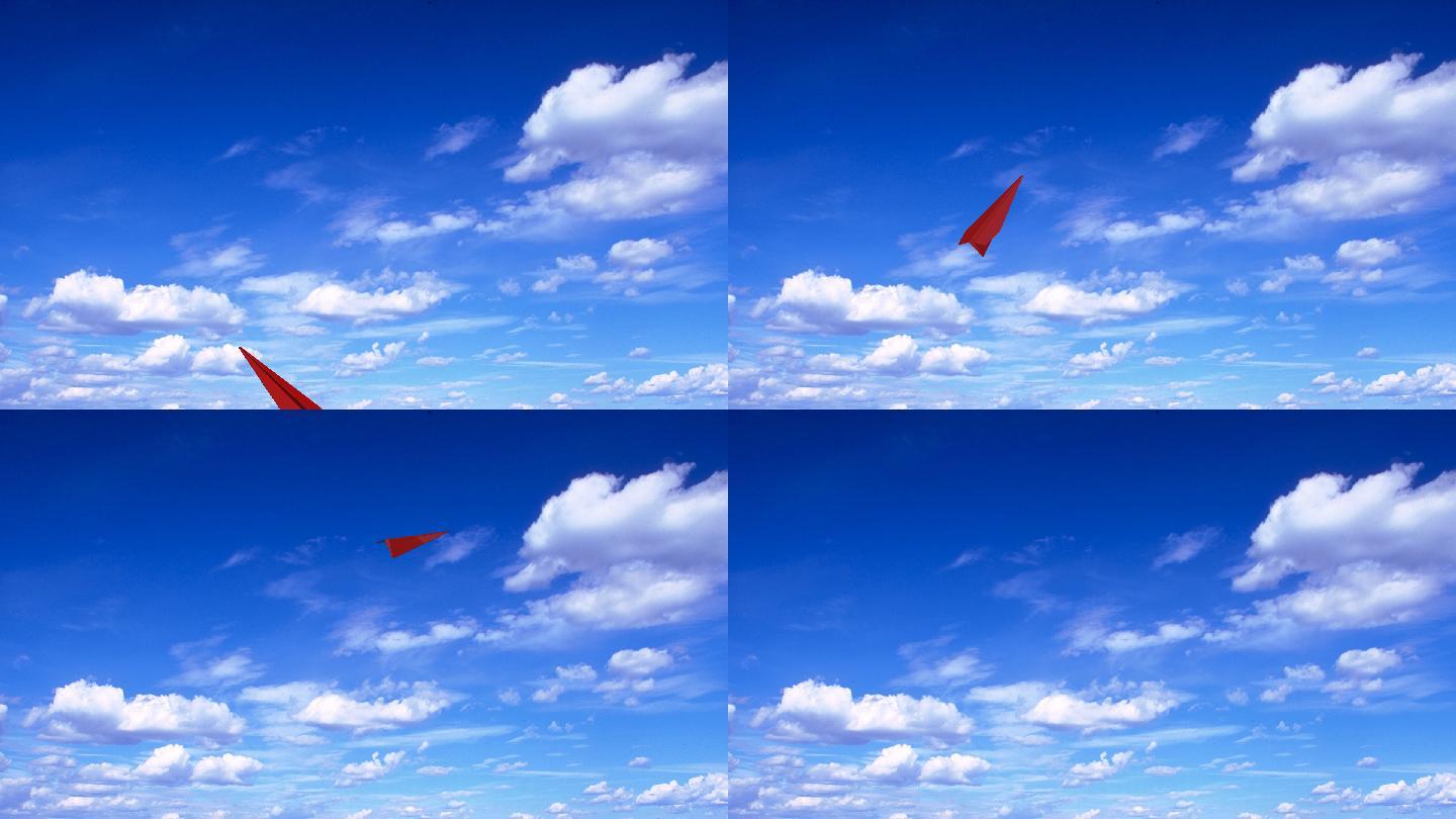 红色纸飞机飞向远方白云
