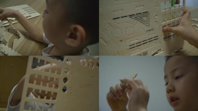 小男孩玩拼图积木