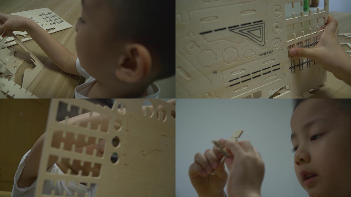 小男孩玩拼图积木