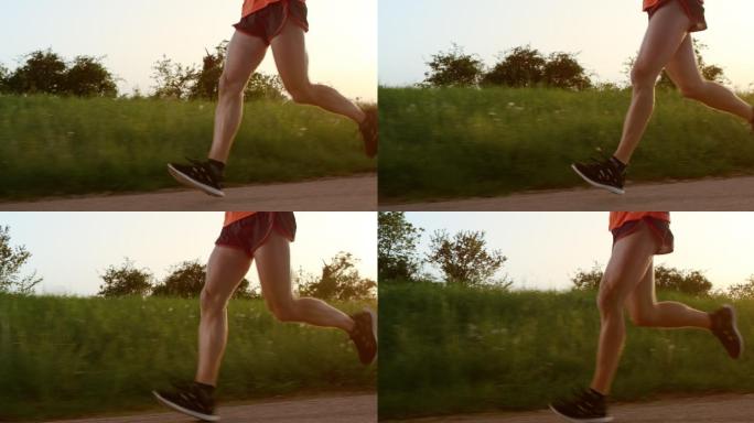 在日落中跑步乡村公路短裤健康生活方式